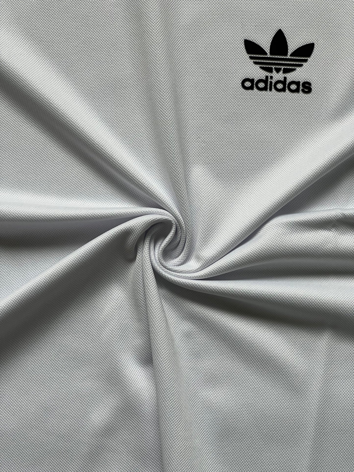 A-d-i-d-a-s imported White Dri-Fit T-Shirt β Performance & Style Combined