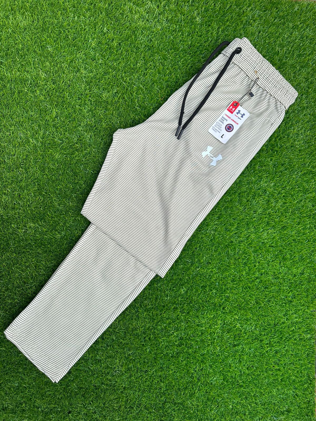 Under Armour Trouser Off White colour – Comfort Meets Performance